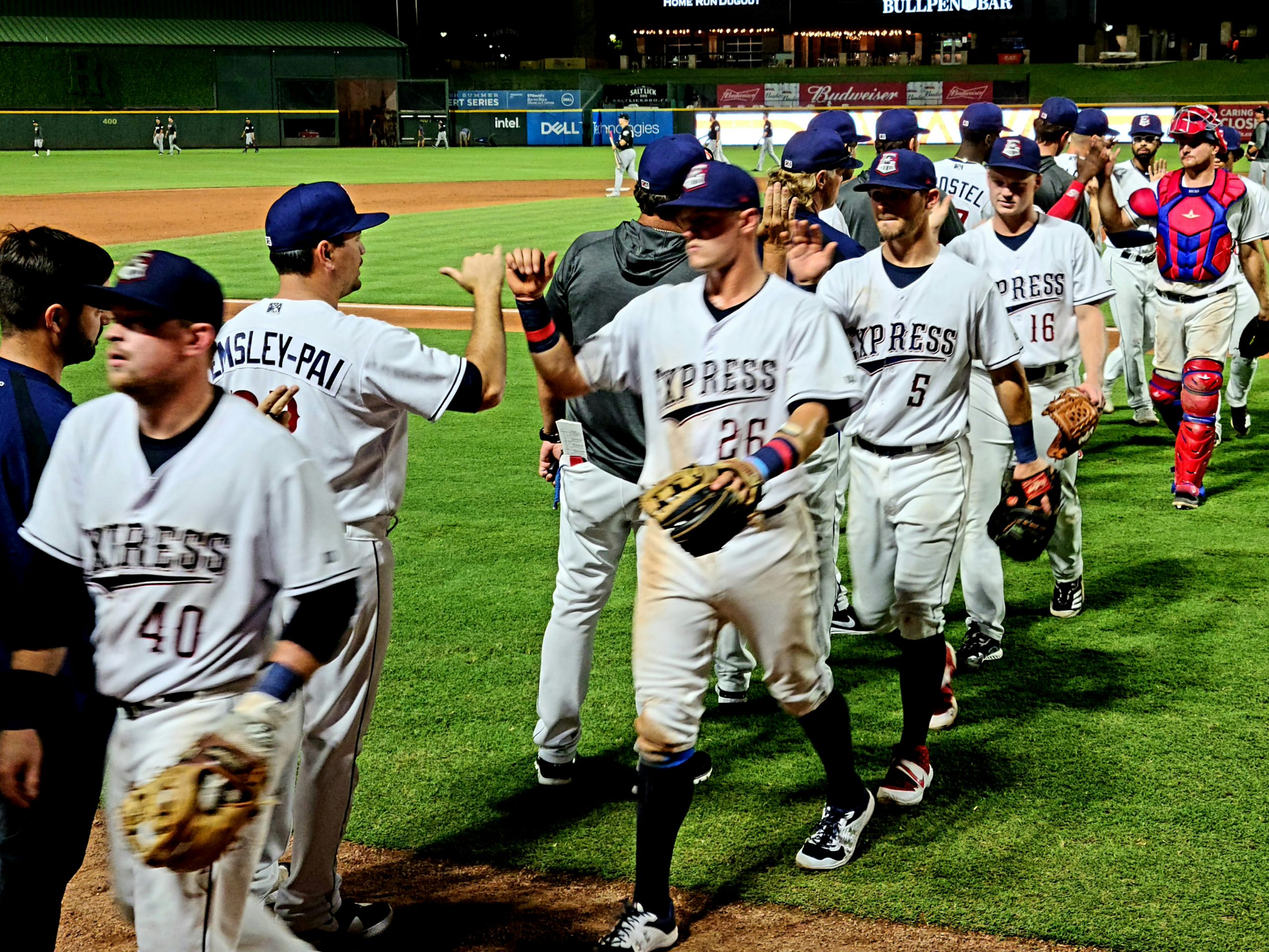 Post game high fives in Round Rock, photo by: Michael Owen