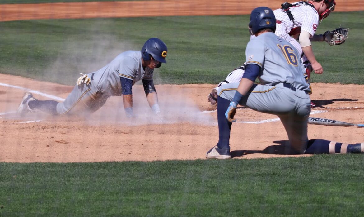 Cal scores a run against OU in game one